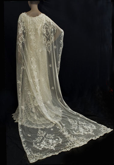 Lace cape edwardian wedding dress
